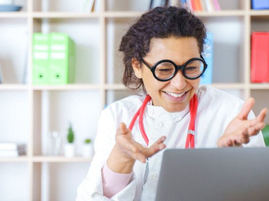 Doctor Helping Patient Via Telehealth Making Video Call