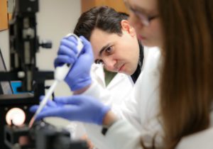 A pharmacy student working in a lab