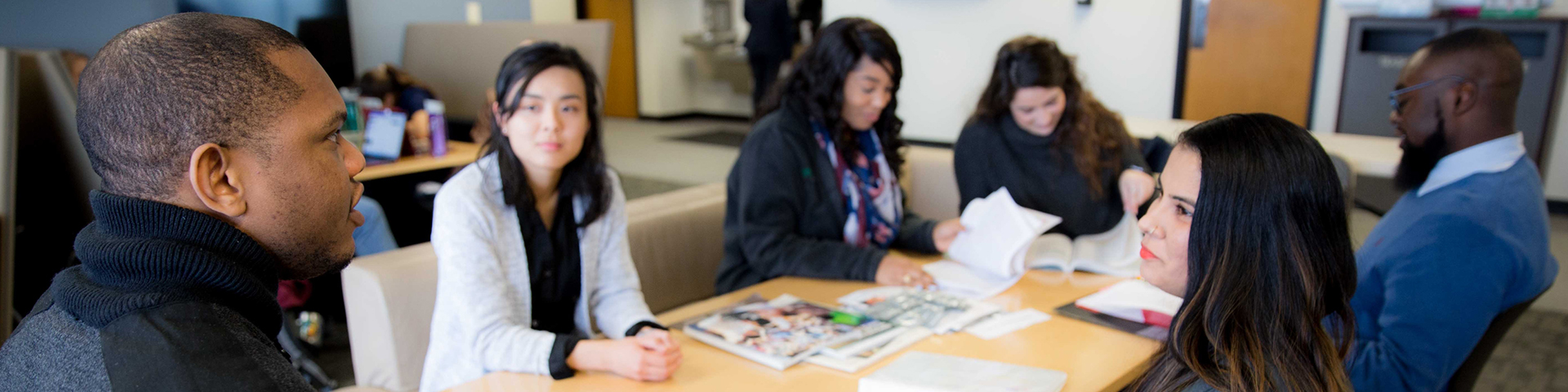 photo of student presenting to other students