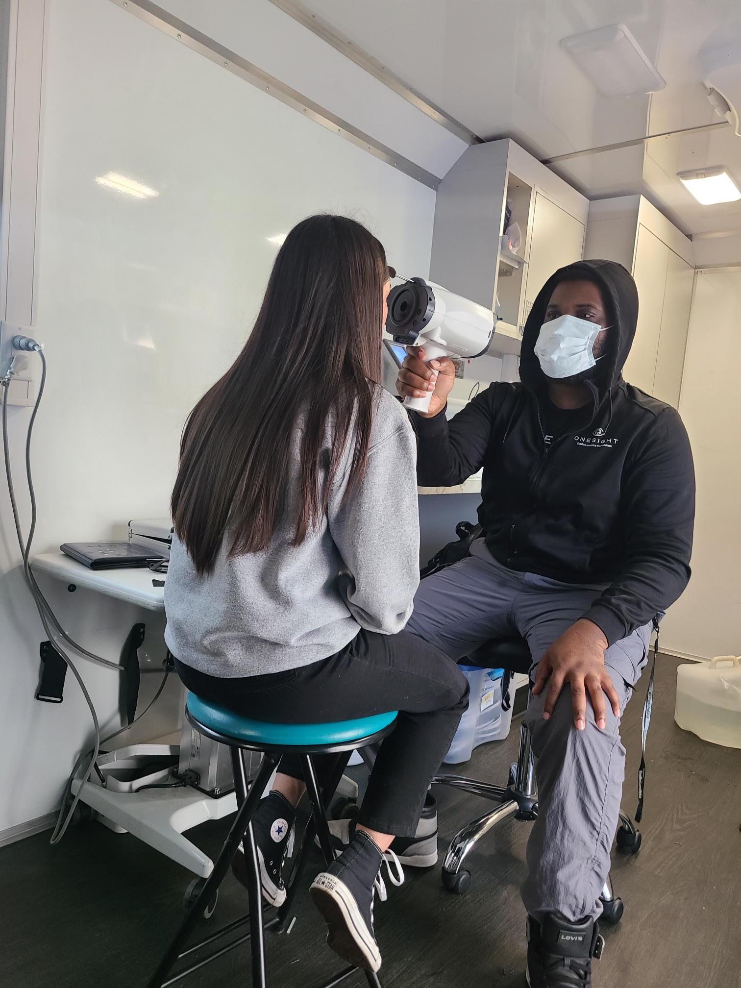 Woman getting her eyes tested.