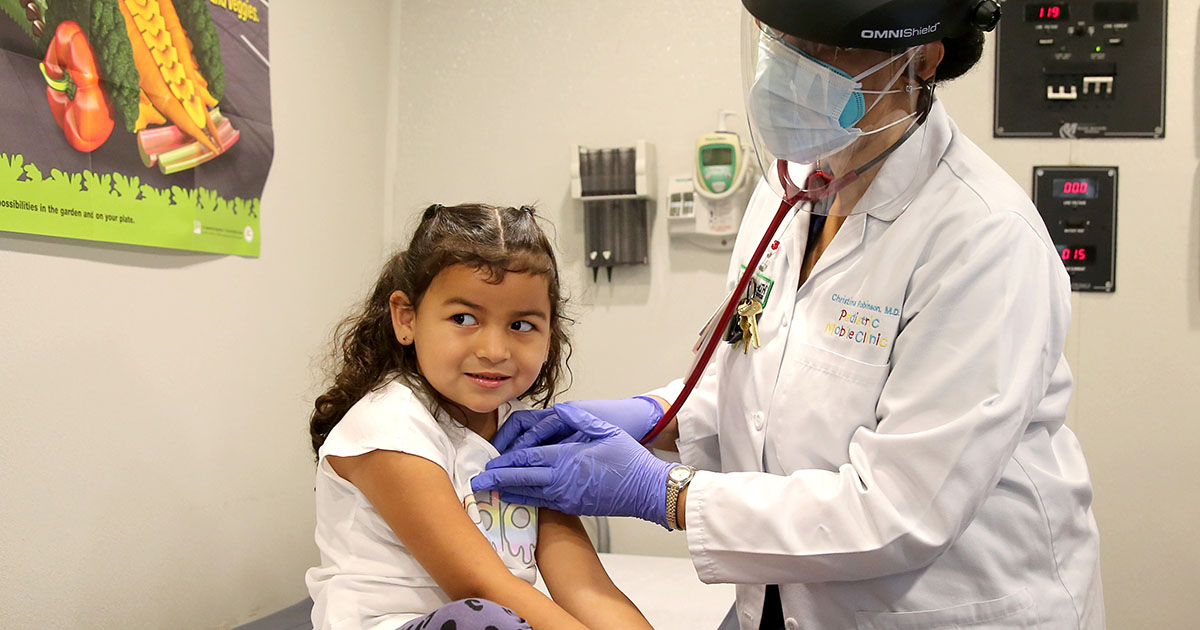 Hsc Pediatric Mobile Clinic Doctor With Patient Sm