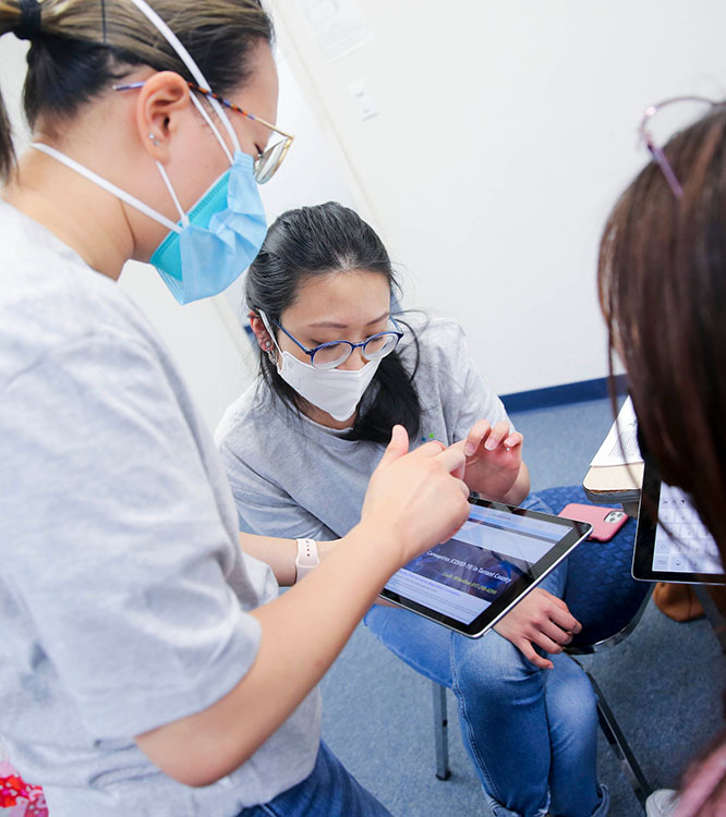 Stop Six Vaccination Clinic. Hsc Students Help Register Patients To Get The Vaccine.