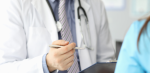 Gastroenterologist with pen and clipboard