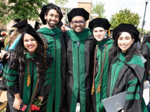 graduates in graduation robes and caps